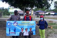 Bhabinkamtibmas Polsek lampeong sampaikan pesan pola hidup sehat di Desa Lampeong I.