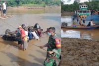 Warga bersama aparat saat mengevakuasi Mobil Innova tercebur di Sungai Barito.
