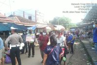Satuan Lalulintas  Polres Barito Timur  berpatroli di Pasar Mingguan.