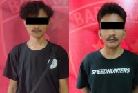 Kedua pelaku saat diamankan polisi