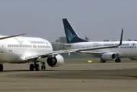 Pesawat milik maskapai penerbangan Garuda Indonesia di Bandara Internasional Soekarno-Hatta, Jakarta. (voaindonesia.com)