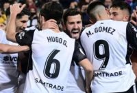 Pemain Valencia melakukan selebrasi saat turun di Copa del Rey melawam Cadiz CF di Mestalla, 2 Februari 2022.(AFP/JOSE JORDAN)