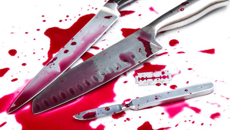 Murder. Knife in pool of blood