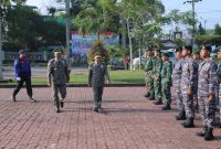 Bupati Asahan saat upacara HUT Satpol PP, Satlinmas dan Damkar di halaman Kantor Bupati Asahan, Selasa (07/03/2023). Foto: Irwan/1tulah.com