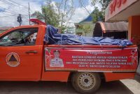 Mobil BPBD Kabupaten Barsel berikan ratusan paket sembako yang hendak disalurkan kepada masyarakat yang terdampak banjir, Selasa (21/3/2023). 
Foto. Alifansyah/1tulah.com
