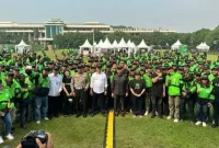 Ketua Komisi V DPR RI Lasarus saat menghadiri program keselamatan berlalu lintas yang dihadiri ratusan sopir (driver) ojol/mitra. Sumber  foto : suara.com
