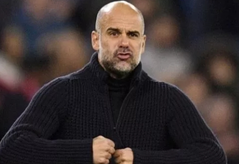 Ekspresi manajer Manchester City, Pep Guardiola dalam laga Liga Inggris kontra Arsenal di Stadion Etihad, Manchester, Kamis (27/4/2023) dini hari WIB. [OLI SCARFF / AFP]