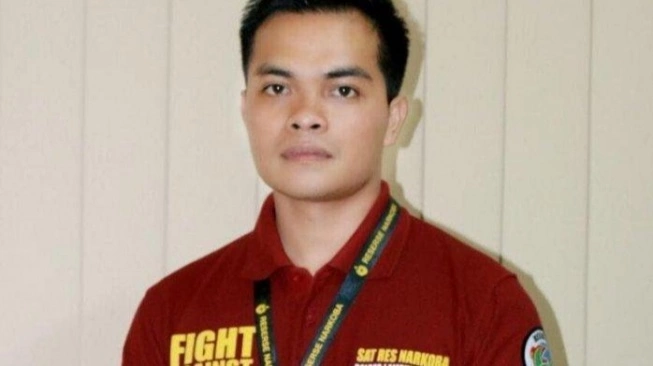 Sosok AKP Andri Gustami, Polisi Rangkap Jabatan Kurir Narkoba Fredy Pratama. Sumber foto : suara.com