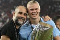 Striker Manchester City, Erling Haaland (kanan). [Louisa Gouliamaki / AFP]