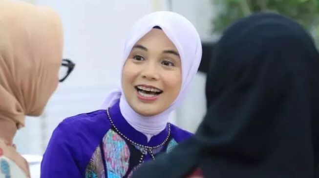 Istri Ganjar Pranowo, Siti Atiqoh. (foto: suara.com)