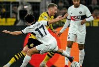 Paris Saint-Germain (PSG) lolos ke babak 16 besar Liga Champions setelah bermain imbang 1-1 dengan Borussia Dortmund. Sumber foto : suara.com