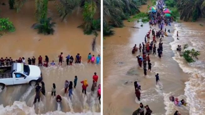 Banjir di Indrifiri Hulu jadi wisata dadakan (sumber: suara.com)