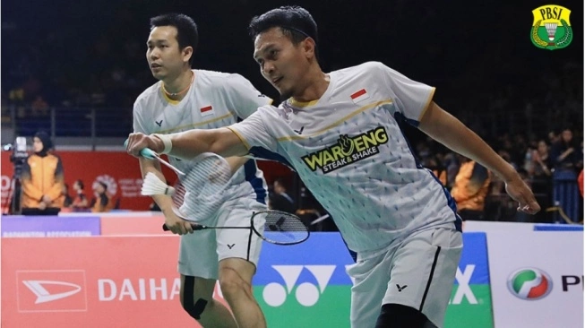Pasangan ganda putra Indonesia, Hendra Setiawan / Mohammad Ahsan. Sumber foto : suara.com