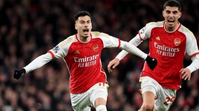 Ekspresi kegembiraan pemain Arsenal kalahkan Liverpool 3-1  (sumber: suara.com)