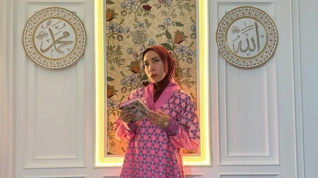Fakta Agama Melly Goeslaw (sumber: suara.com)
