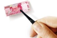 Ilustrasi uang palsu (sumber: suara.com)