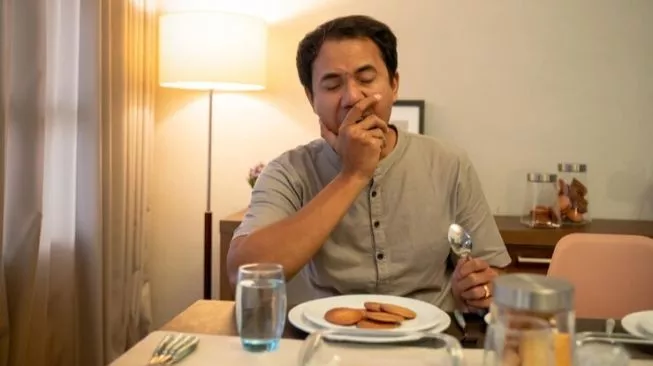 Ilustrasi telat sahur (sumber: suara.com)