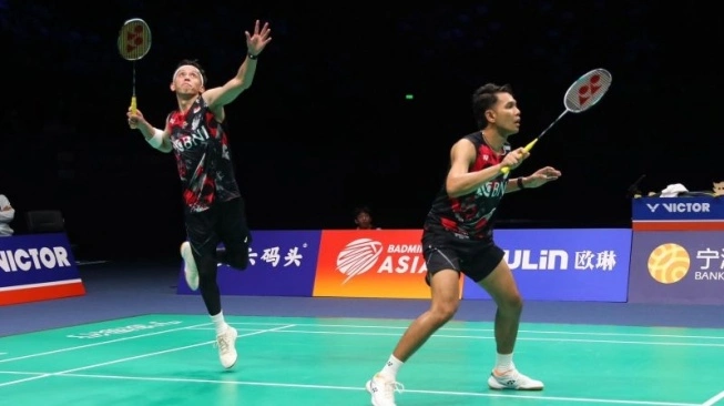Ganda putra Indonesia Fajar Alfian/Muhammad Rian Ardianto saat berlaga di perempat final Kejuaraan Bulu Tangkis Asia (BAC) 2024 di Ningbo, China, Jumat (12/4/2024) (sumber: suara.com)
