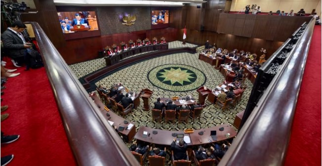 Sidang sengketa hasil pemilu di Mahkamah Konstitusi Jakarta, 5 April 2024. (Foto: Adek BERRY/AFP)
