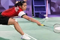 Pebulu tangkis tunggal putri Indonesia Gregoria Mariska Tunjung mengembalikan kok ke pebulu tangkis Korea Selatan An Se-young (sumber: suara.com)