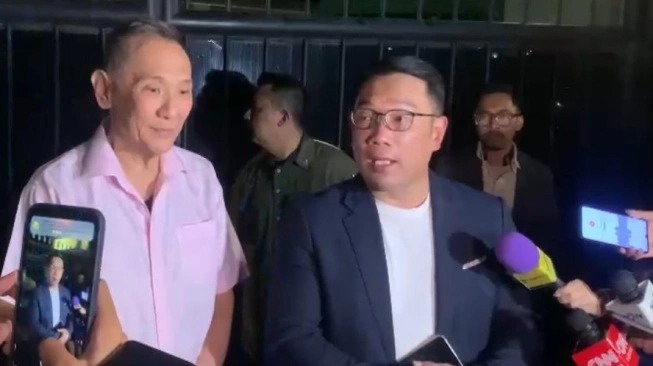 Bakal Cagub Jakarta Ridwan Kamil usai bertemu Ketum Partai Golkar Airlangga Hartarto  (sumber: suara.com)