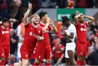 Gelandang Liverpool asal Inggris, Harvey Elliott melakukan selebrasi setelah mencetak gol keempat timnya selama pertandingan pekan ke-36 Liga Inggris antara Liverpool vs Tottenham Hotspur di Anfield di Liverpool, barat laut Inggris pada 5 Mei 2024.Darren Staples/AFP.