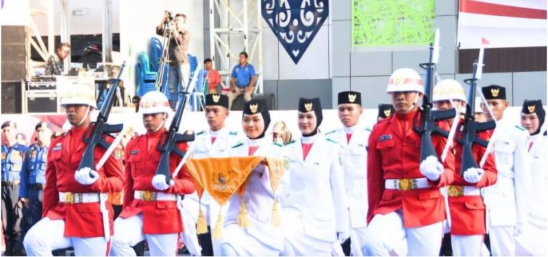 Upacara penurunan Bendera Merah Putih dalam rangka memperingati HUT Proklamasi Kemerdekaan ke-79 Republik Indonesia di Kabupaten Barito Utara berlangsung dengan khidmat dan lancar, Sabtu (17/8/2024) sore.Foto:Delia/1tulah.com