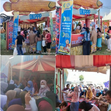 Kepala DKPPP Barsel, Ida Safitri berserta jajaranya saat melayani pengunjung yang ingin membeli pangan murah di stand DKPPP pada event Barsel Expo 2024, yang berlansung di Stadion Batuah, Buntok, Senin (16/9/2024). Foto. Alifansyah/1tulah.com