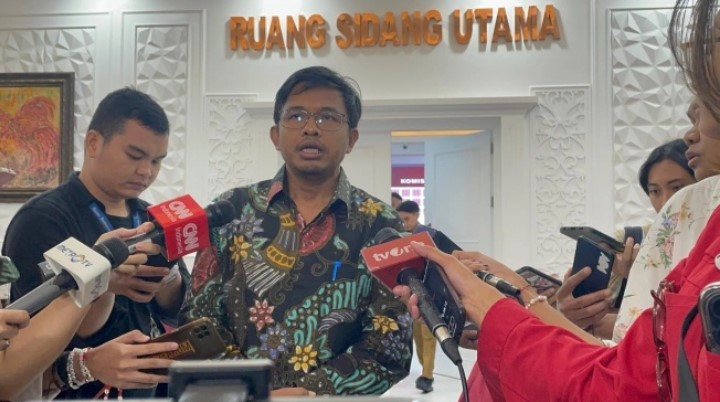 Anggota KPU RI Idham Holik. [Suara.com/Dea]