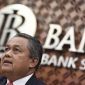 Gubernur Bank Indonesia Perry Warjiyo memberikan keterangan pers hasil Rapat Dewan Gubernur di kantor Bank Indonesia. (sumber: suara.com)