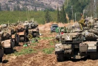 Pasukan Israel siapkan invasi darat ke Lebanon. Tank pasukan Israel terlihat di daerah dekat perbatasan utara Israel dengan Lebanon pada Kamis (27/9/2024). (sumber: suara.com)