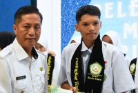 Pj Bupati Barito Utara (Barut), Kalteng, Muhlis, menghadiri acara perpisahan angkatan 63 MAN Barut yang dilaksanakan di Gedung Balai Antang Muara Teweh, Rabu, 9 April 2025. Foto: Diskominfosandi