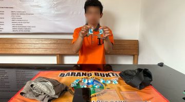 Tersangka seorang pemuda berinisial RO alias R (21) warga Jalan Cempaka Putih, Melayu ditangkap dengan ratusan butir narkoba jenis ineks di THM Widuri. Foto: Humas Polres Barut