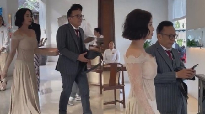 Potret Dearly Djoshua, wanita yang diduga temani Ari Lasso di pernikahan Luna Maya dan Maxime Bouttier. [X]