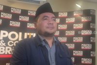 Ketua Komisi Pemilihan Umum (KPU) RI, M Afifudin mengatakan putusan MK soal Pemilu nasional-daerah dipisah bikin beban KPU berkurang. (Suara.com/Bagaskara)