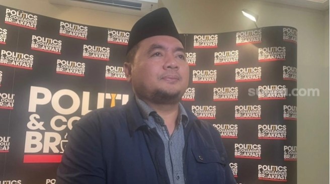 Ketua Komisi Pemilihan Umum (KPU) RI, M Afifudin mengatakan putusan MK soal Pemilu nasional-daerah dipisah bikin beban KPU berkurang. (Suara.com/Bagaskara)