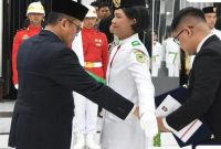 Pemkab Barito Utara melaksanakan Upacara Pengukuhan Paskibraka 2025 di Gedung Balai Antang Muara Teweh, Jumat malam (15/8/2025). Foto: Diskominfosandi Barut