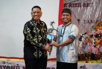 Pertunjukan Wayang Kulit Banjar digelar di Ruang Terbuka Publik (RTP) Pasar Lawas Pelaihari, sebagai bagian dari rangkaian peringatan HUT Ke-80 RI. Foto: MC Tala
