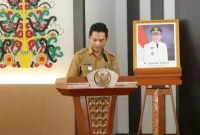 Plt. Kabid Bangkom Soskulpem, Rano, Saat membacakan Laporan (MMC Kalteng)