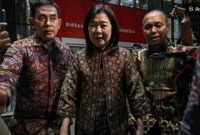 Deputi Gubernur Bank Indonesia Filianingsih Hendarta (tengah). [ANTARA FOTO/Fauzan/YU] 