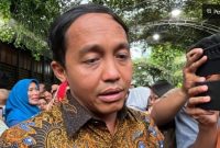 Politisi PSI Raja Juli Antoni usai menemui Presiden ke-7 RI Jokowi di Solo,. (Suara.com/Ari Welianto) 