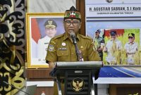 Plt. Sekda yang juga Kepala BAPPERIDA Prov. Kalteng Leonard S. Ampung saat menyampaikan Sambutan Sekaligus Membuka Acara