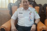 M. Taupik Kepala Disperkimtan Barsel saat diwawancarai diruang kerjanya. Rabu (11/2/2026). Foto. Alifansyah/1tulah.com