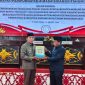 Penyerahan LKPJ Pemkab Mura oleh Wakil Bupati Murung Rahmanto Muhidin, kepada ketua DPRD Rumaidi dalam rapat paripurna dewan, Selasa (10/03/2026).