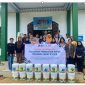 PT Pama foto bersama dengan tim binaan mereka di sebuah desa di Kecamatan Teweh Selatan.Foto.Dok. PAMA