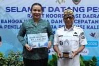 Bupati Heriyus dan istri 