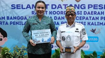 Bupati Heriyus dan istri 