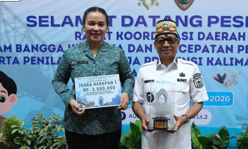 Bupati Heriyus dan istri 