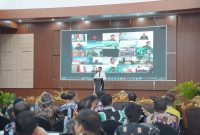 Plt. Kepala Dinas Pendidikan Kalimantan Tengah Muhammad Reza Prabowo saat memberikan sambutan pada pembukaan Rapat Koordinasi Penyusunan Kalender Pendidikan dan Sosialisasi SPMB Tahun Ajaran 2026/2027 di Aula Berkah Disdik Kalteng. (7/5/26)