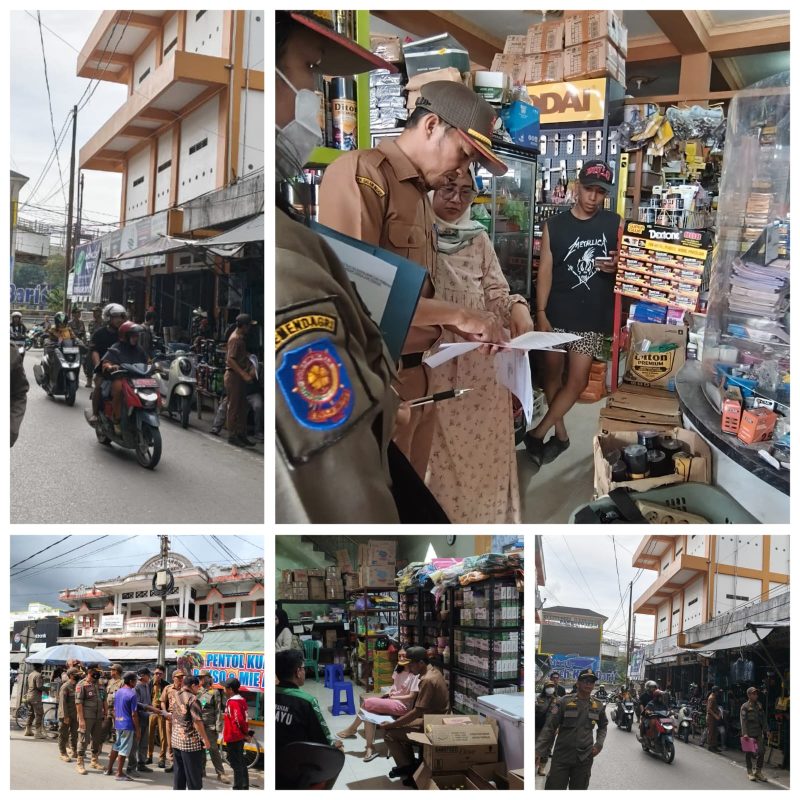 Foto Satpol PP memberikan sosialisasi kepada pedagang dan atau pelaku usaha ekonomi di Kawasan Perkotaan Muara Teweh 